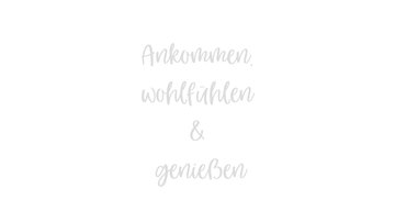 An inviting phrase on a light background: "Arrive, feel good & enjoy". The words convey a sense of coziness and relaxation.